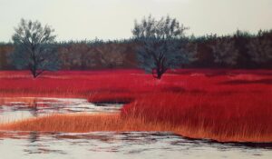 Galeria Wiele Sztuki prezentuje wielkoformatowy obraz akrylowy Jacka Malinowskiego „Paesaggio XII”. Horyzontalna kompozycja (150x90 cm) ukazuje jezioro z pasem intensywnie czerwonych trzcin na pierwszym planie. Praca wyróżnia się mocną, ciekawą, czerwoną kolorystyką szuwarów kontrastującą z chłodnymi błękitami wody i nieba.