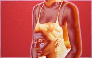 Galeria Wiele Sztuki prezentuje obraz Macieja Wichnowskiego „O Judycie bez Holofernesa”. Kompozycja w tonacjach czerwieni i różu, przedstawiająca kobiecą postać, która zdaje się trzymać w dłoniach własną głowę.